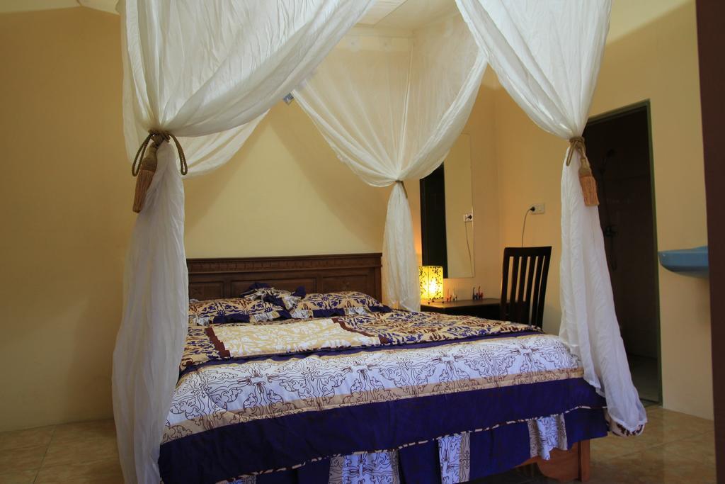 Gangga Homestay Мундук Номер фото