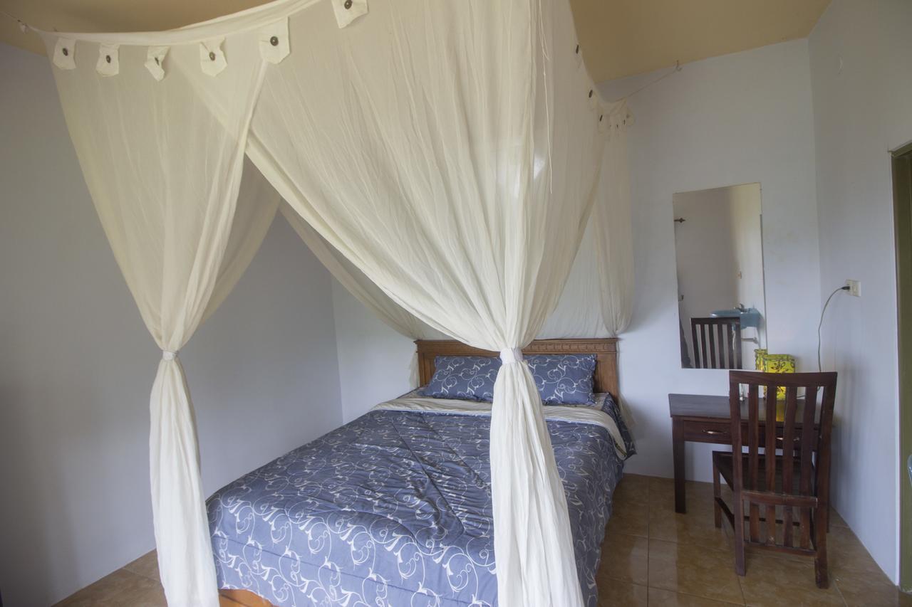 Gangga Homestay Мундук Экстерьер фото