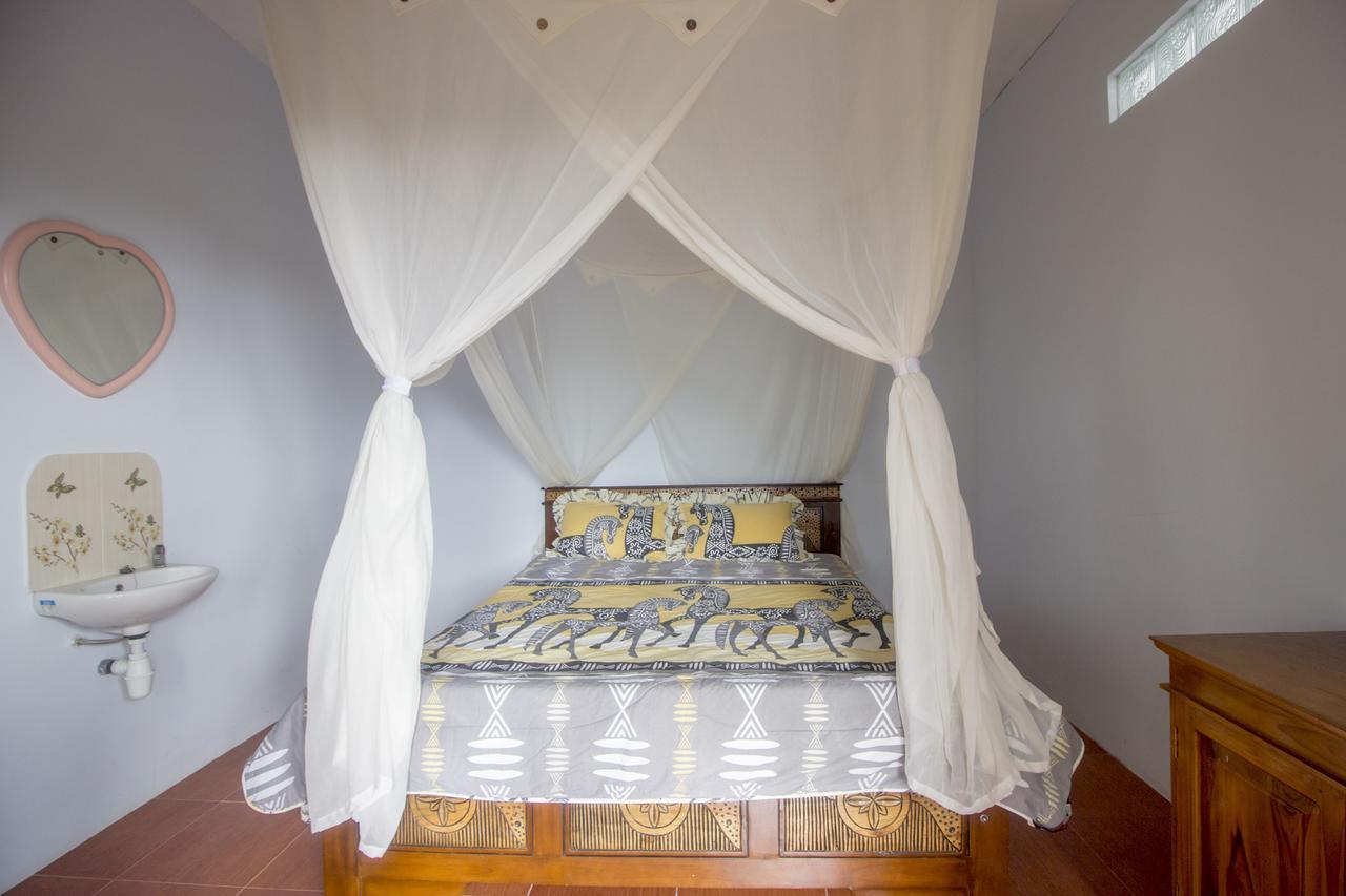 Gangga Homestay Мундук Экстерьер фото