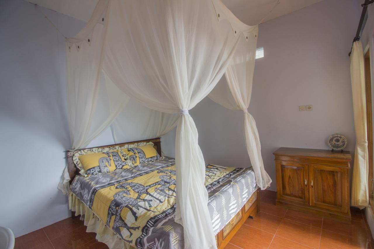 Gangga Homestay Мундук Экстерьер фото